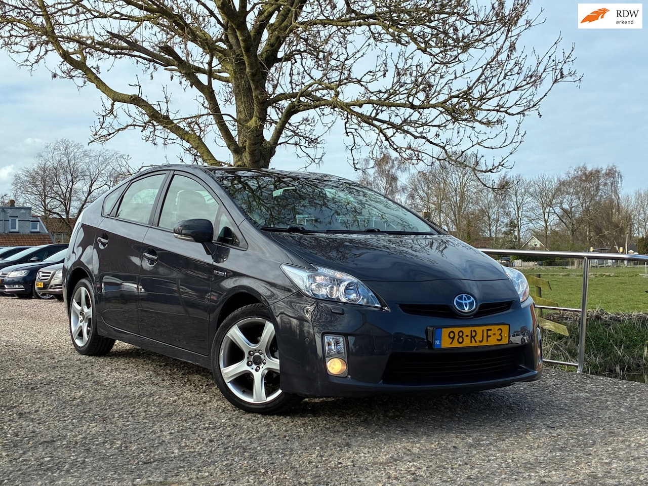 Toyota Prius - 1.8 Executive Business |HUD + Cruise + Clima + Navi Nu € 7.975,-!!! - AutoWereld.nl