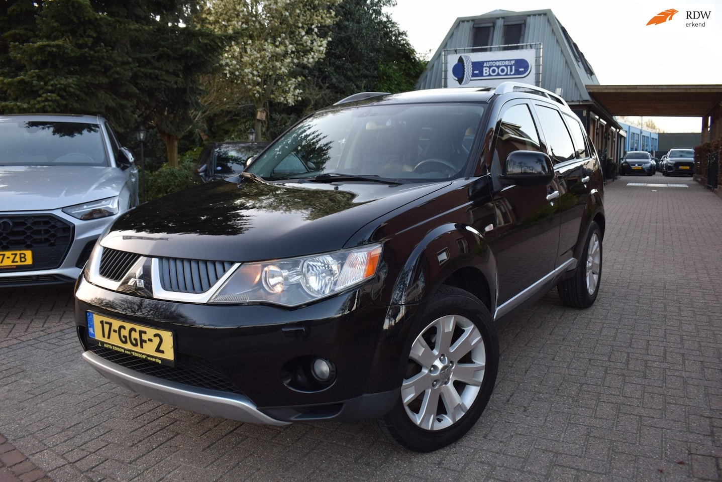 Mitsubishi Outlander - 2.4 Instyle 7 PERS/AUTOM/PANO DAK/AIRCO-ECC/CRUISE/NAVI/NL-AUTO/TREKH/CARPLAY/BLUETOOTH/PD - AutoWereld.nl
