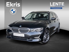 BMW 3-serie Touring - 320i | Luxury Line | Achteruitrijcamera | Panoramadak | Stoelverwarming | LED | Lentevoord