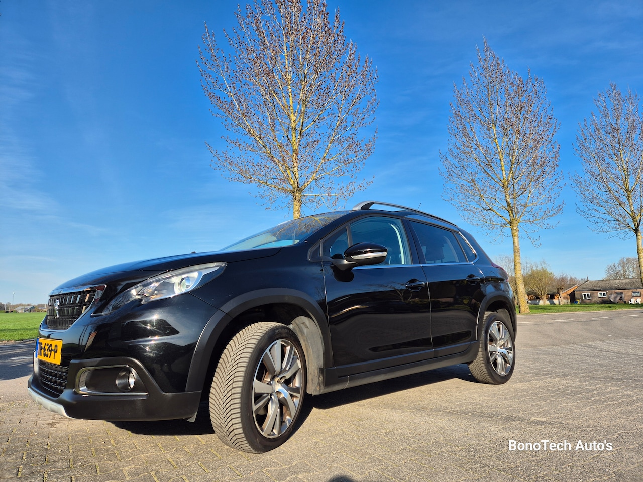 Peugeot 2008 - 1.2 PureTech Blue Lease Allure - AutoWereld.nl