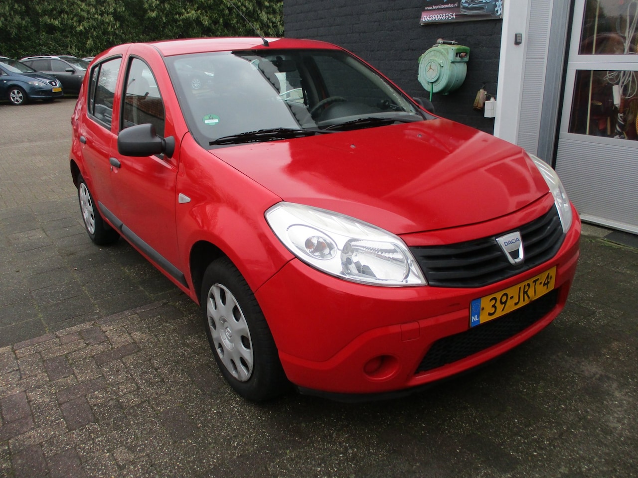 Dacia Sandero - 1.2 Ambiance APK 12-2026! VOLLE TANK! - AutoWereld.nl