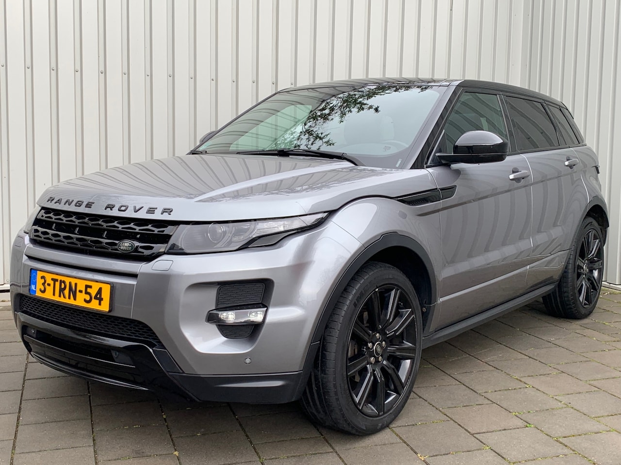 Land Rover Range Rover Evoque - 2.0 Si 4WD Prestige|Panoramadak|Navigatie|Climate Control| - AutoWereld.nl
