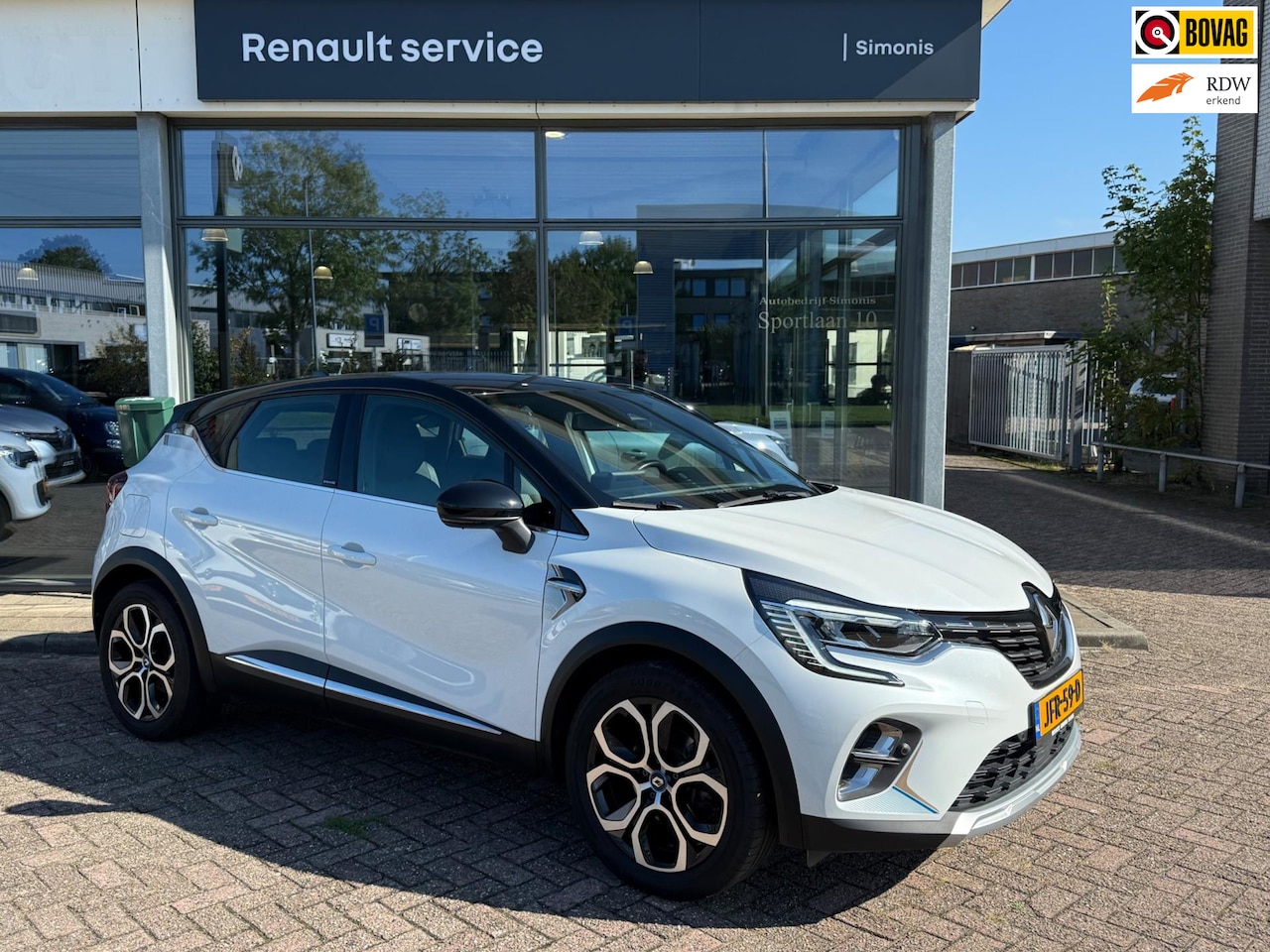 Renault Captur - 1.6 E-Tech Série Limitée Plugin-Hybrid Hybrid Plug-in - Navi groot scherm + cockpit view - AutoWereld.nl