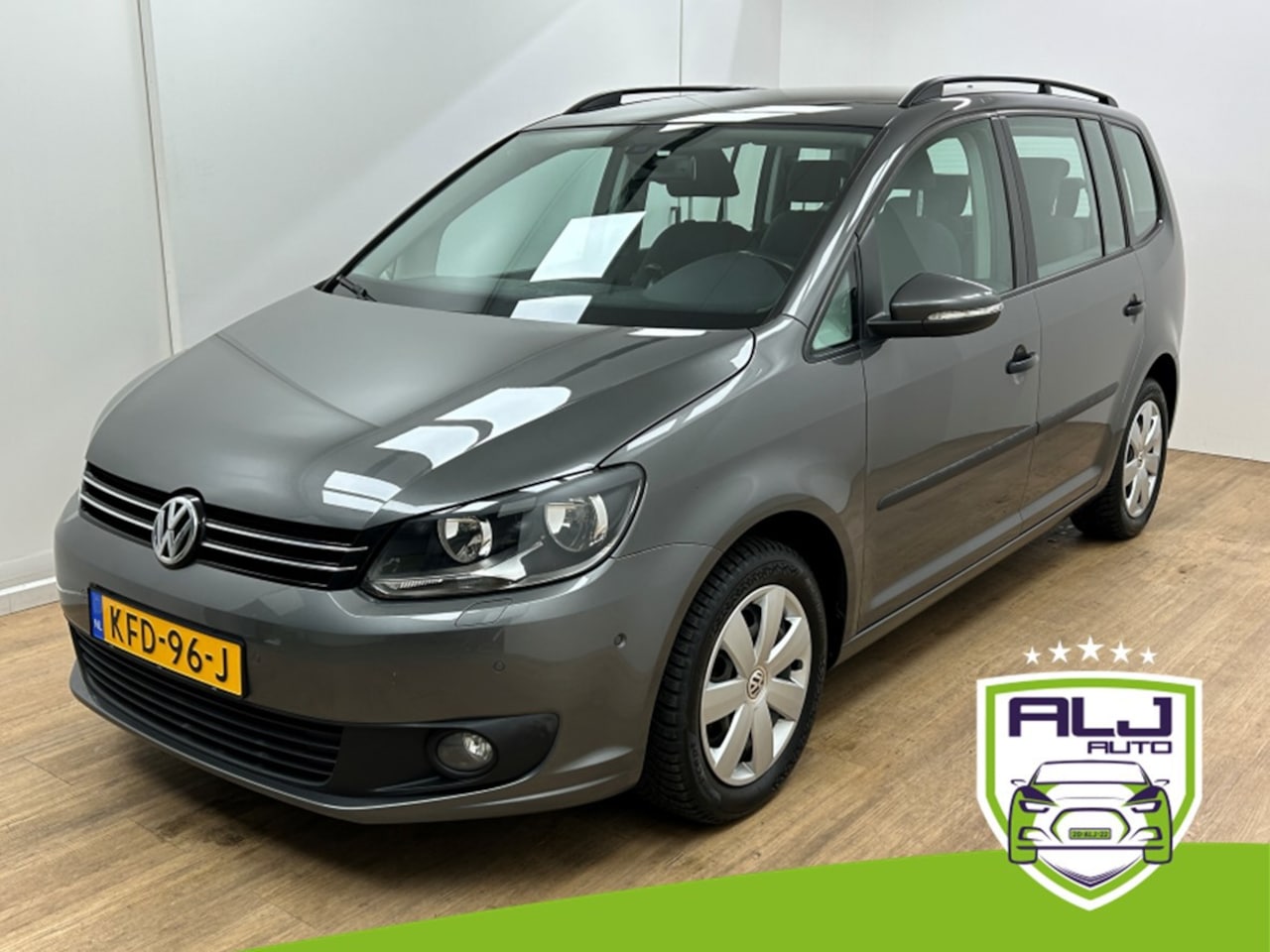 Volkswagen Touran - Occasion 1.2 TSI Highline BlueMotion 7p. | Grijs | Tweedehands Volkswagen Touran | Cruise - AutoWereld.nl