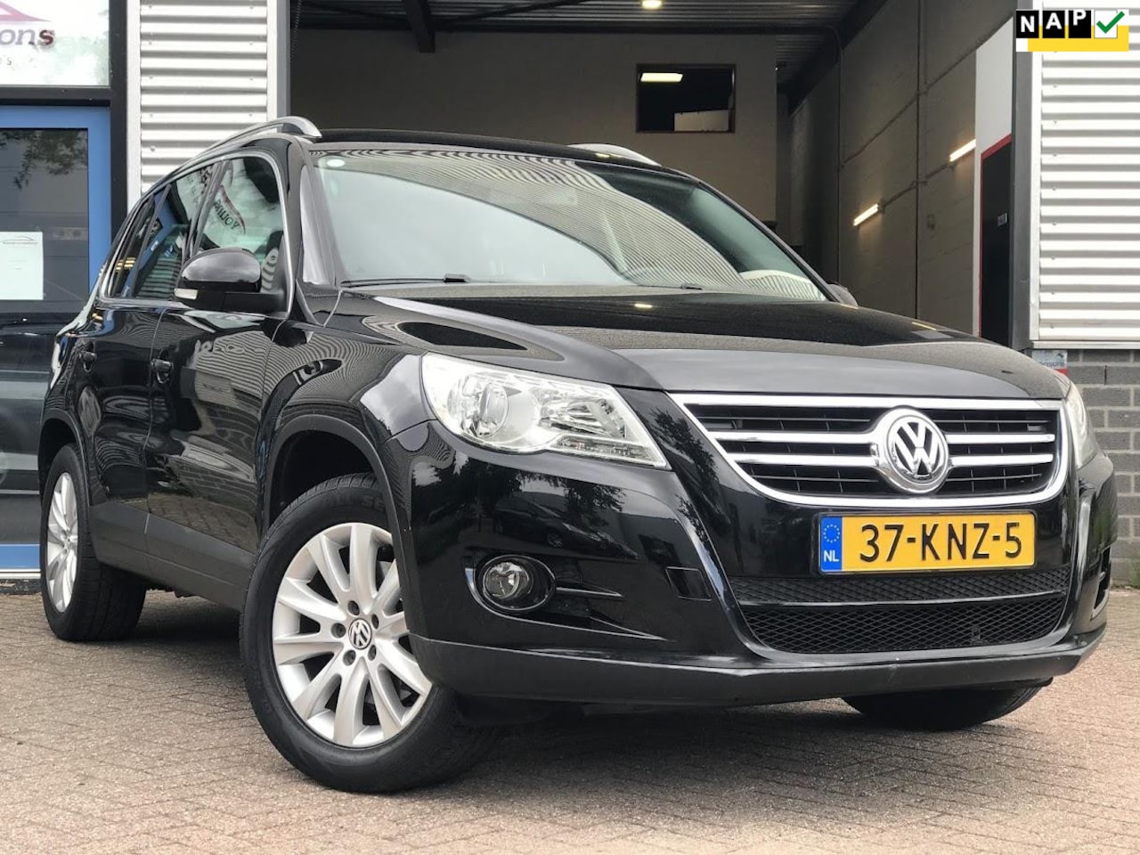 Volkswagen Tiguan - 1.4 TSI Sport&Style|Nieuwe motor 0km|Ecc|Airco|CruiseControl|PDC - AutoWereld.nl