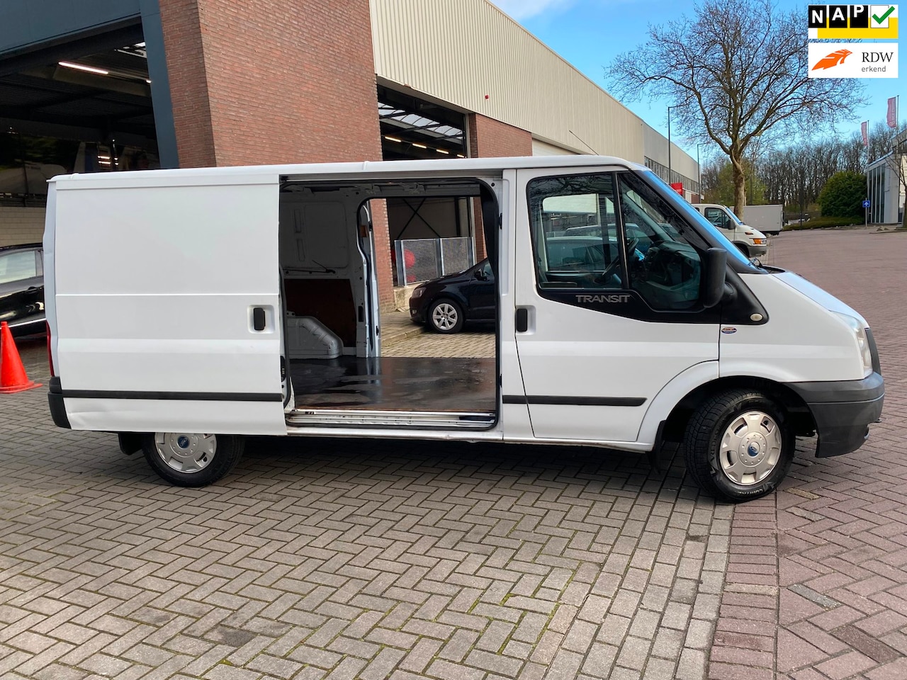 Ford Transit - 280M 2.2 TDCI / 2013 / Airco / 150.175 KM NAP / Lang / 2x Zijdeur / APK 29-9-2026 / 4 x Ni - AutoWereld.nl
