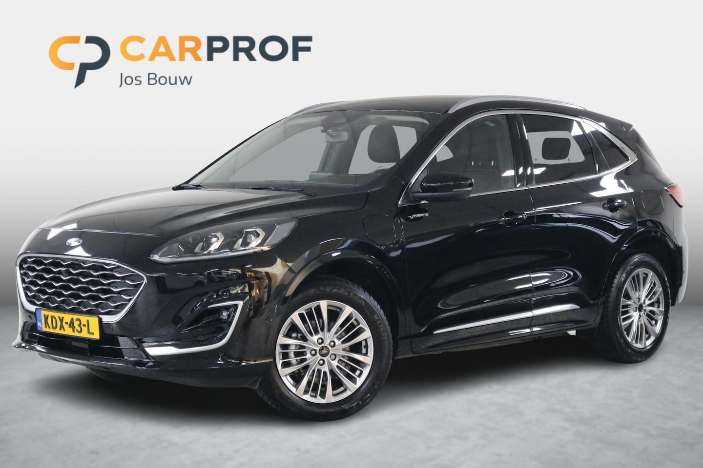 Ford Kuga - 2.5 PHEV Vignale Climate | Leder | Trekhaak | Winterpack | Adaptive Cruise. - AutoWereld.nl