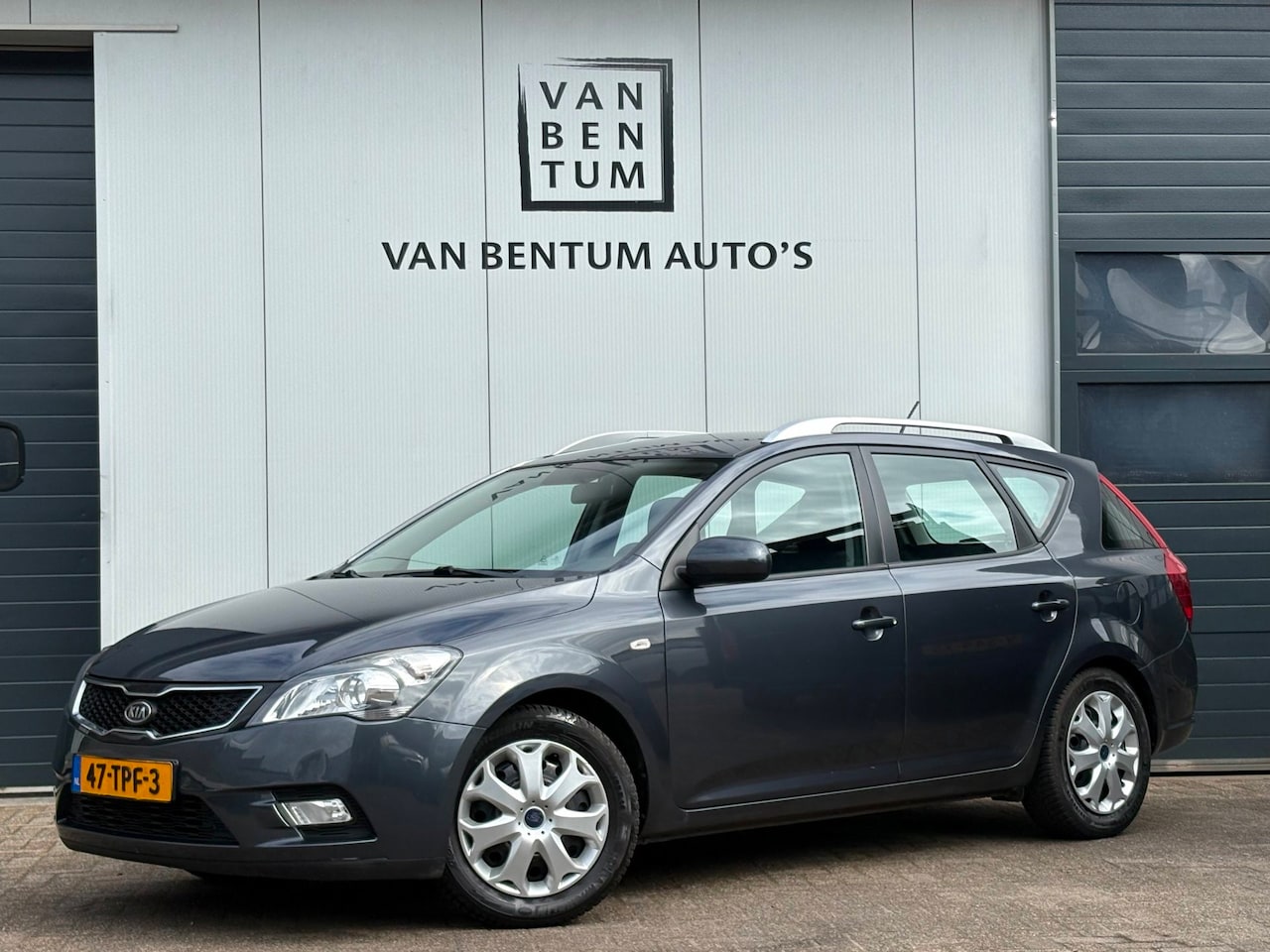 Kia Cee'd Sporty Wagon - 1.4 CVVT Navi Camera Clima Cruise Nwe APK! - AutoWereld.nl