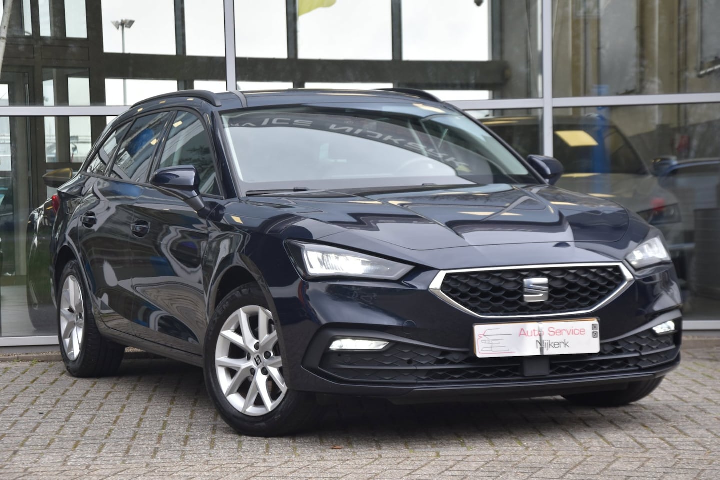 SEAT Leon Sportstourer - 1.0 eTSI Style Business Intense Aut. Nav. Airco Pdc 73d.KM + Inruil Mogelijk - AutoWereld.nl