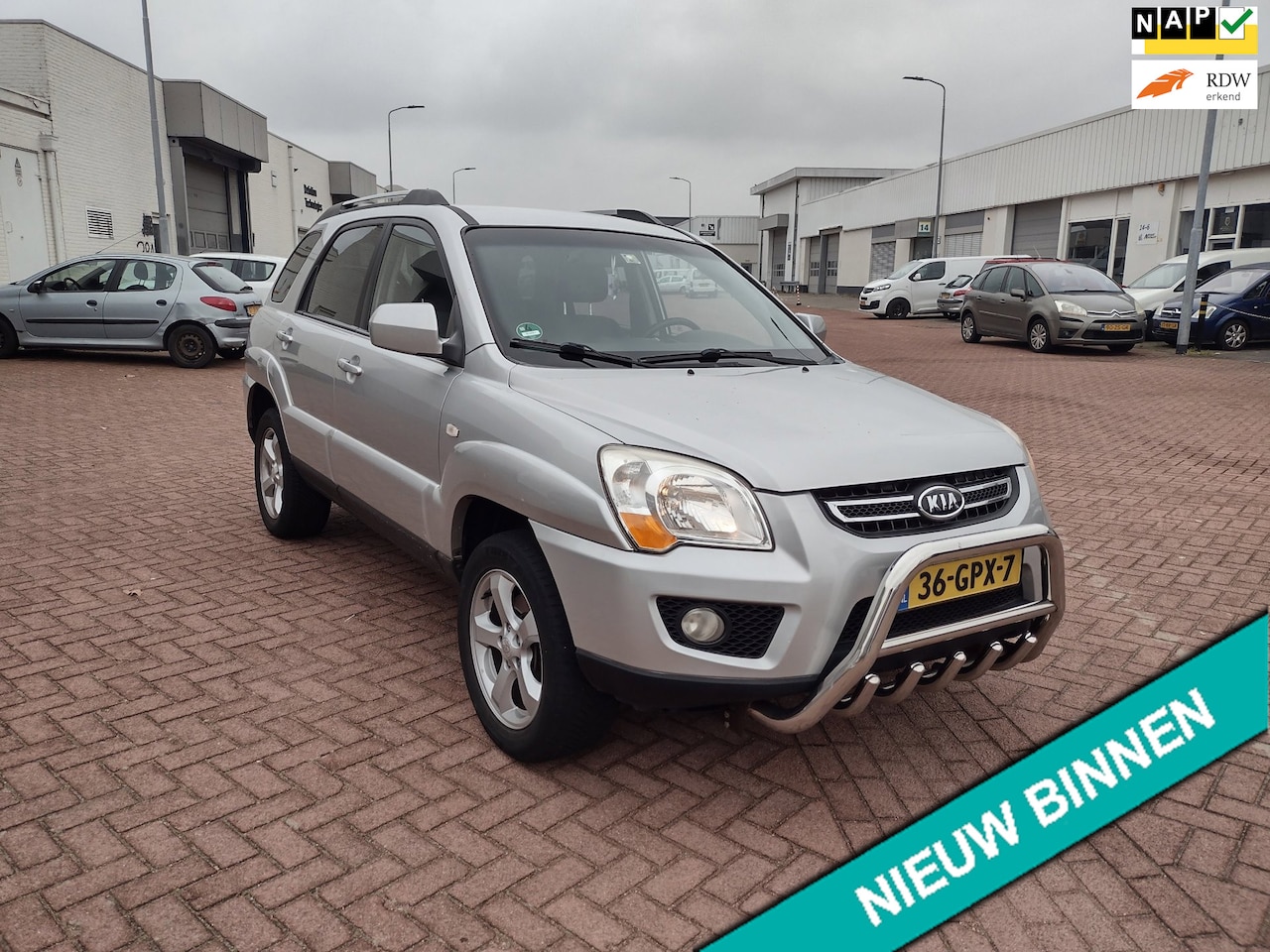 Kia Sportage - 2.0 CVVT X-tra MOOIE AUTO BEL 0619590613 APK 13-04-2027 HOGEN IN STAP - AutoWereld.nl