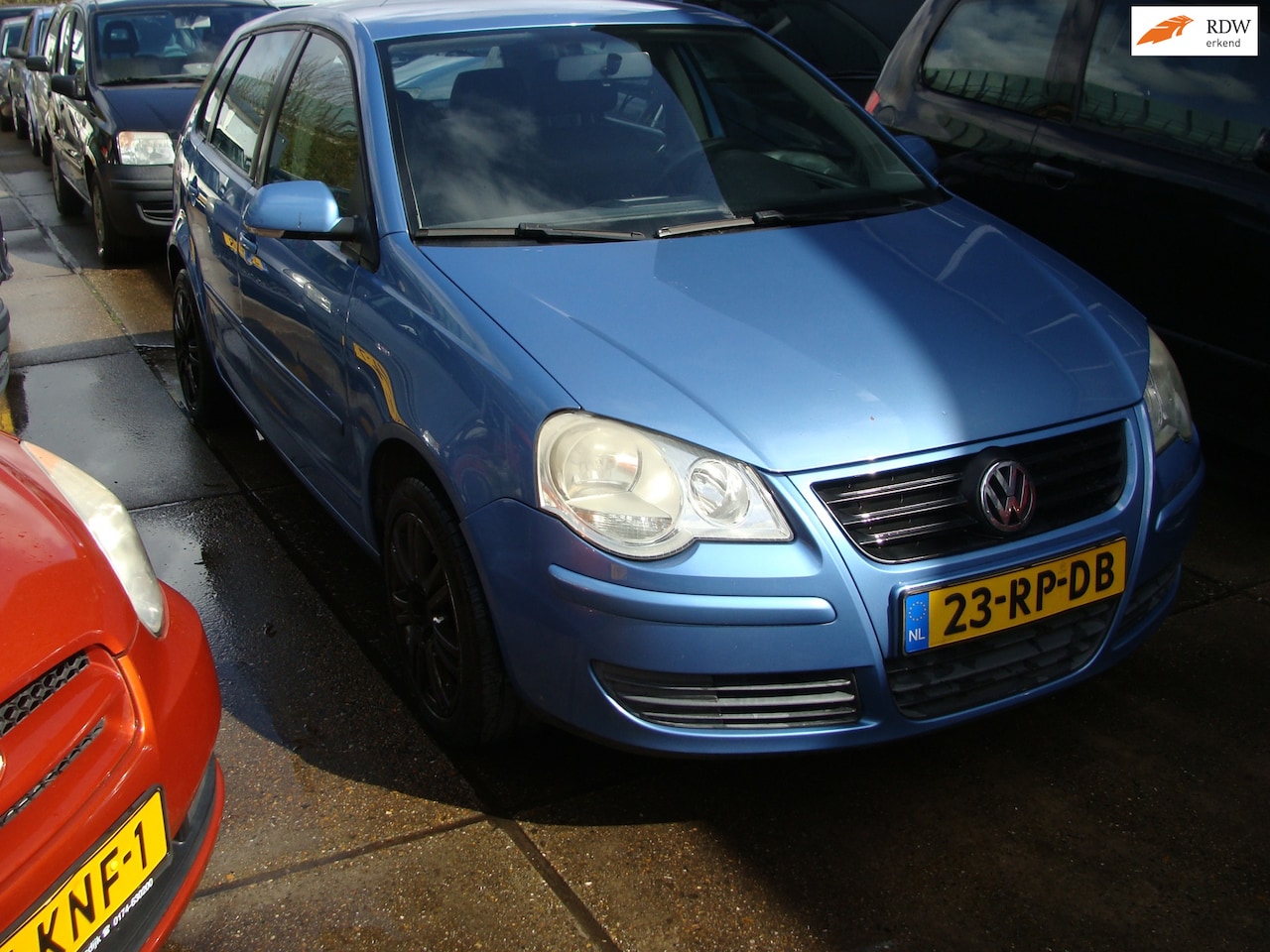 Volkswagen Polo - 1.2-12V Optive st bekr 5 drs airco elek pak nap apk - AutoWereld.nl