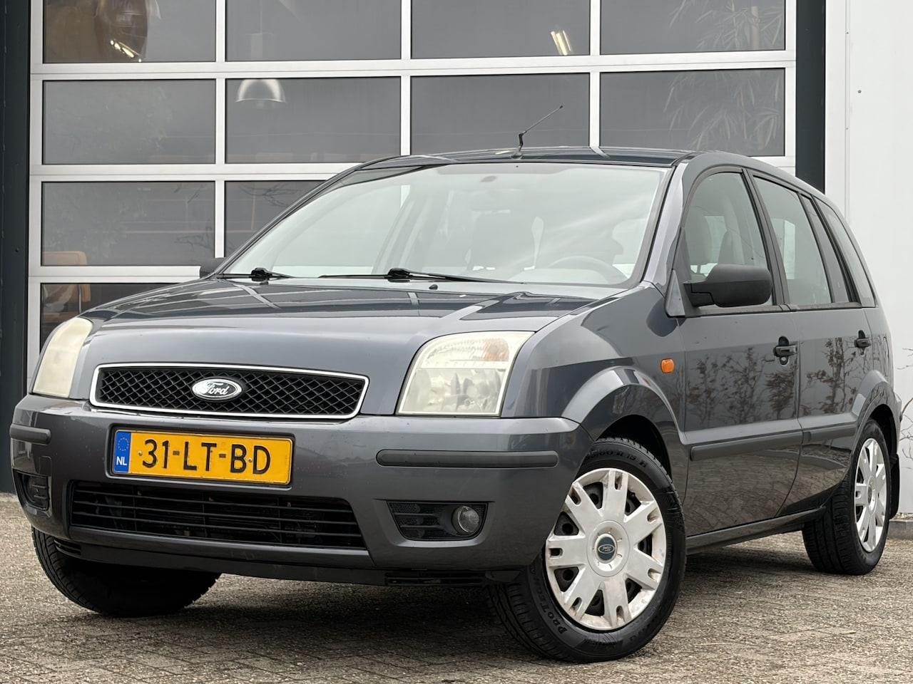 Ford Fusion - 1.6-16V Luxury 100pk | Airco | Centrale vergrendeling | Elektrische ramen voor | Verwarmde - AutoWereld.nl