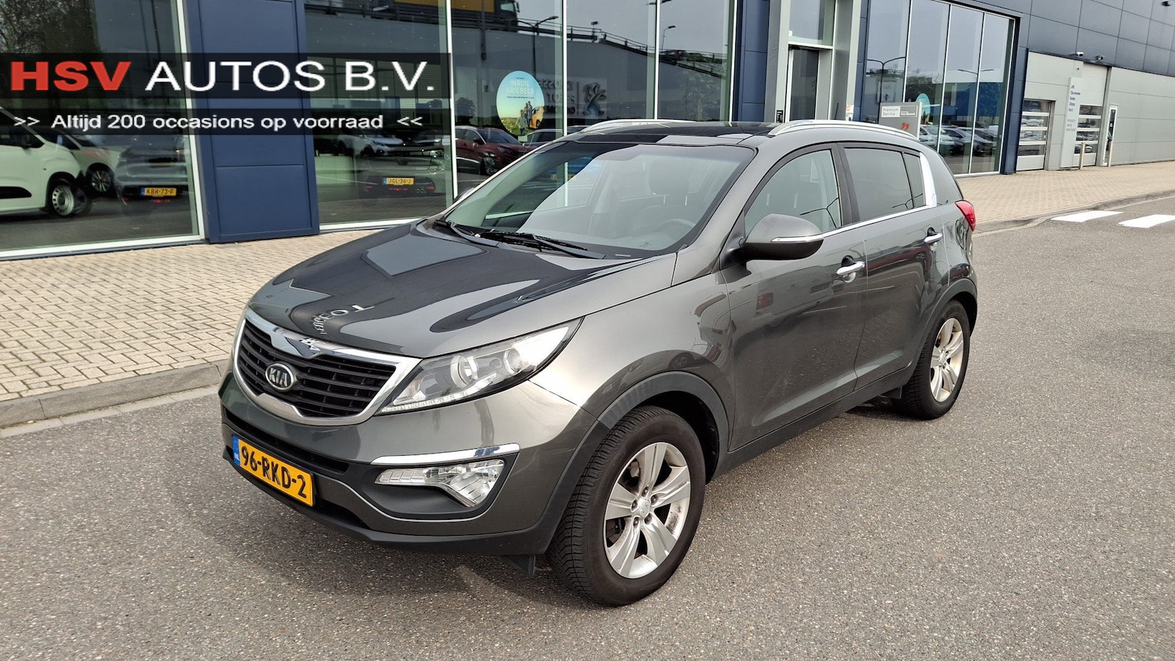 Kia Sportage - 2.0 X-ecutive Plus Pack airco LM panodak org NL - AutoWereld.nl