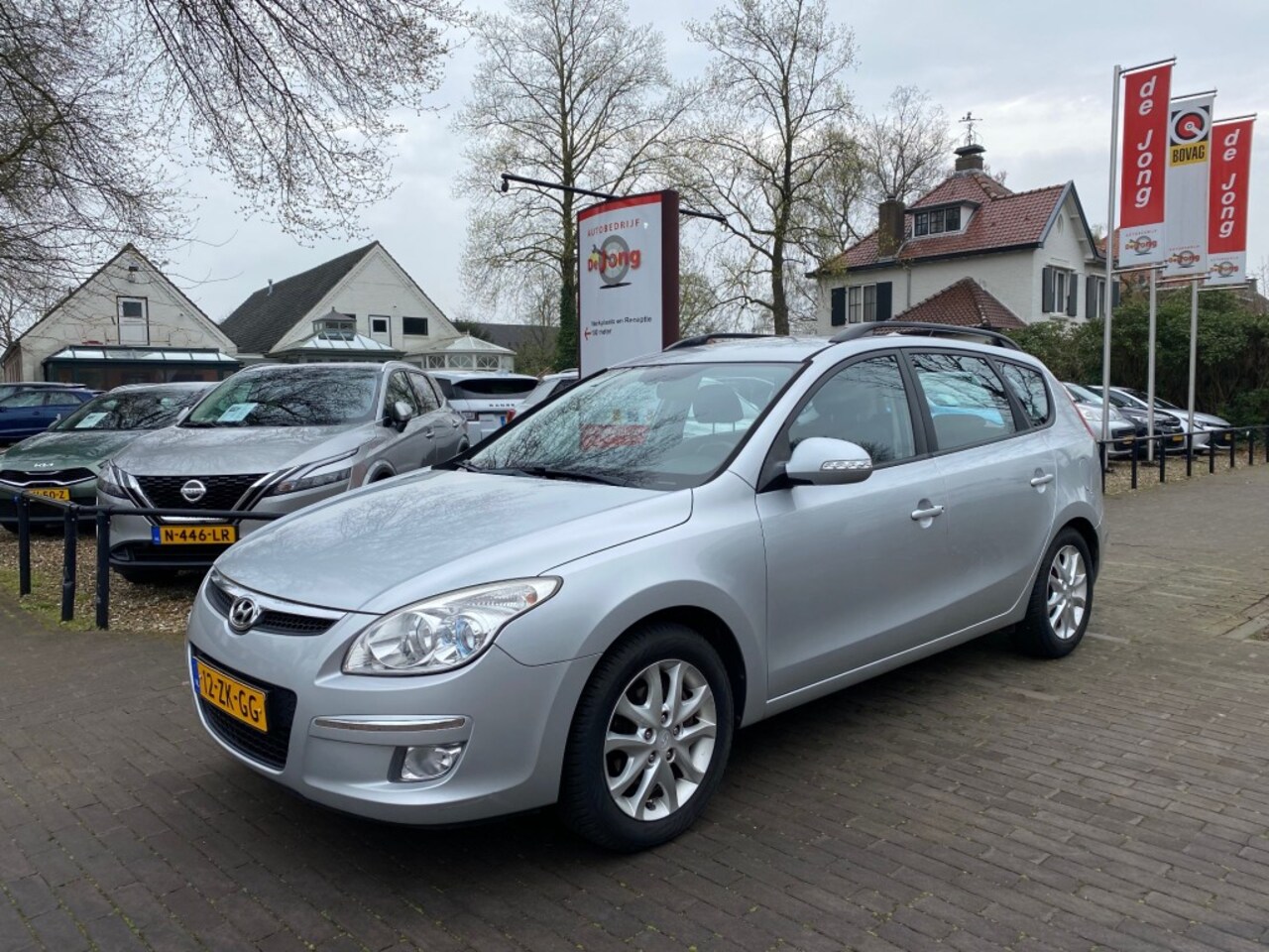 Hyundai i30 - CW 1.6I STYLE AUTOMAAT / AIRCO-ECC / TREKHAAK / ELEK. RAMEN / PDC / 16'' LM-VELGEN - AutoWereld.nl