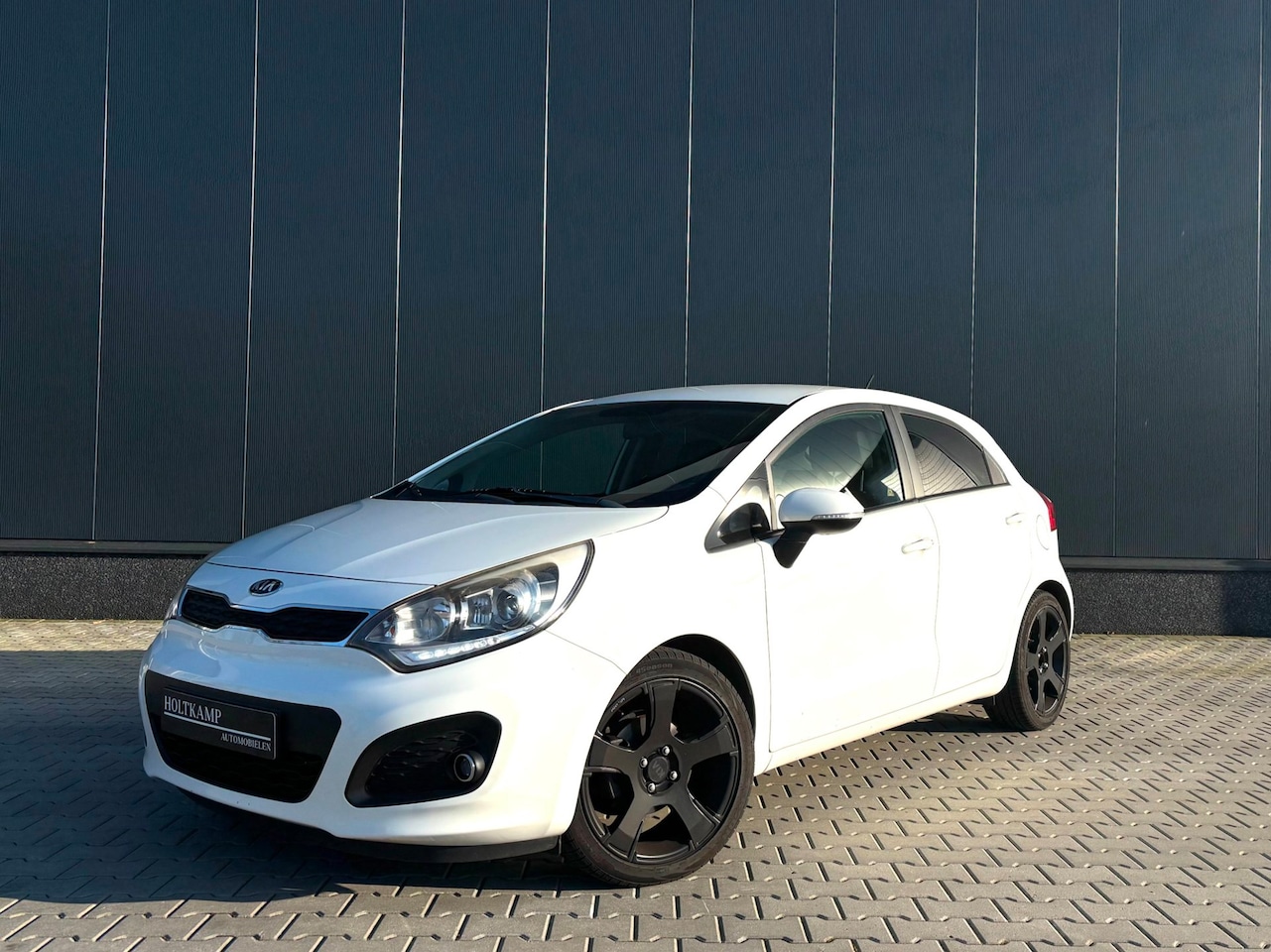 Kia Rio - 1.2 CVVT World Cup Edition | CRUISE | BLUETOOTH | AIRCO | ELEKTRISCHE RAMEN - AutoWereld.nl