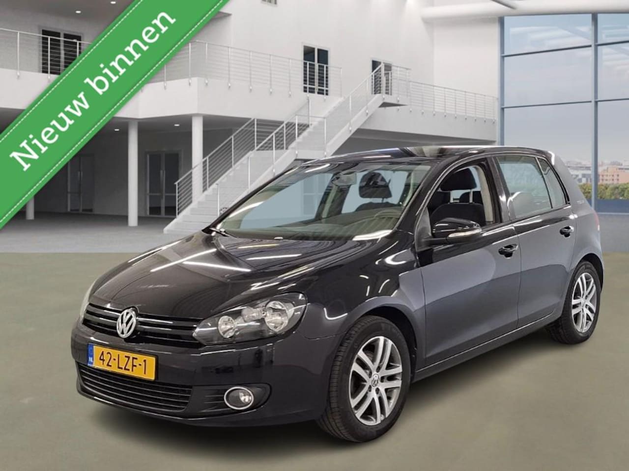 Volkswagen Golf - 1.2 TSI Tour II AIRCO CRUISE MET.LAK NAVI - AutoWereld.nl