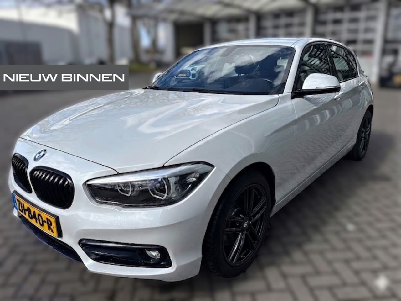 BMW 1-serie - 118i Sport Line Edition | Stoelverwarming | Cruise Control | Parkeersensoren | Navigatie | - AutoWereld.nl