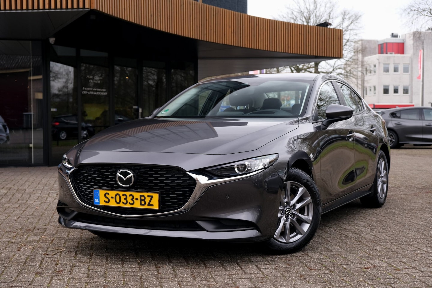 Mazda 3 - 2.0 e-SkyActiv-G M Hybrid 122 Comfort|Camera|ACC|Stuurwielverwarming|Carplay|Keyless| - AutoWereld.nl