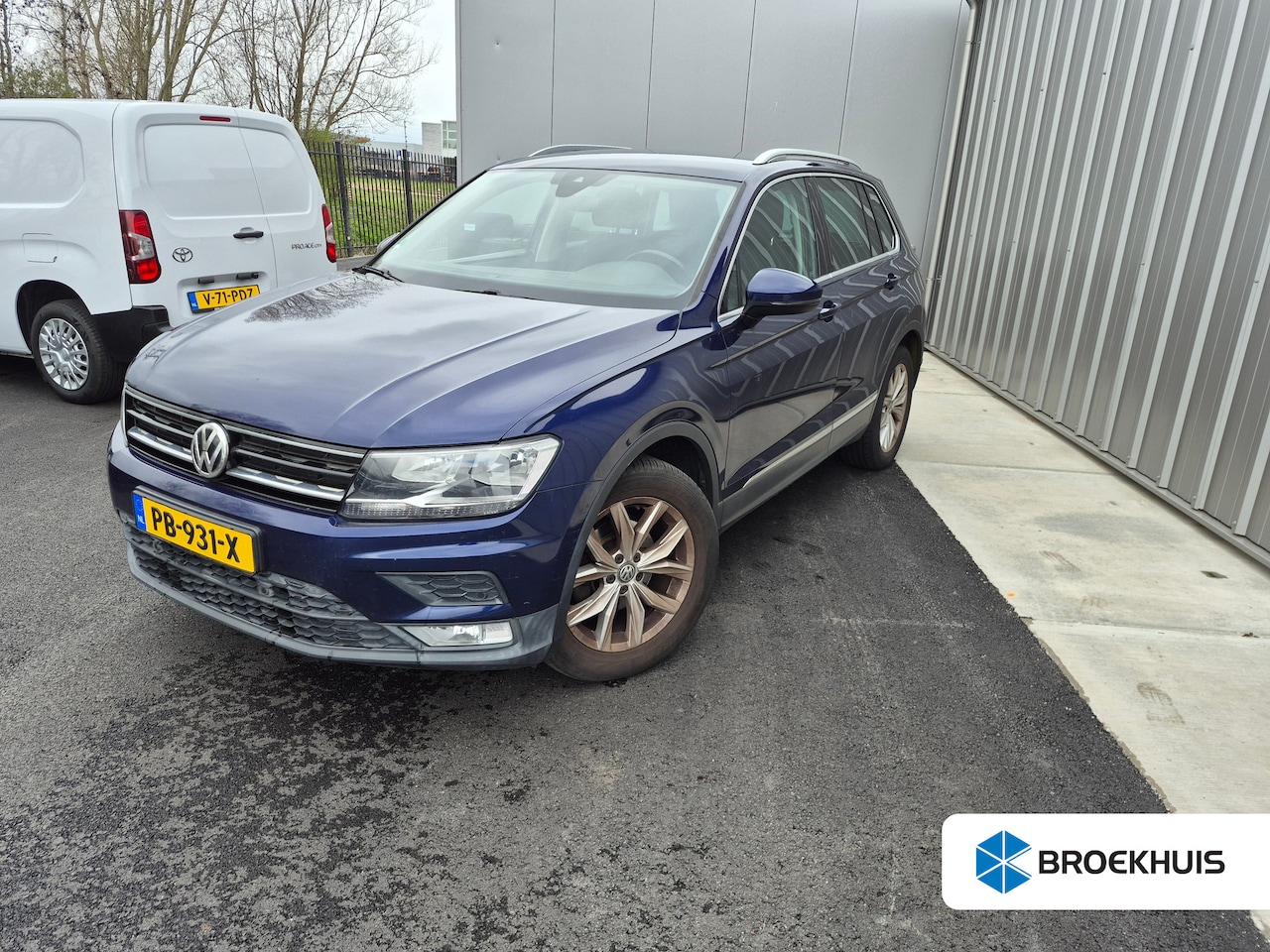 Volkswagen Tiguan - 1.4 TSI ACT Connected Series | Trekhaak | Cruise control | Apple carplay Android auto | Na - AutoWereld.nl