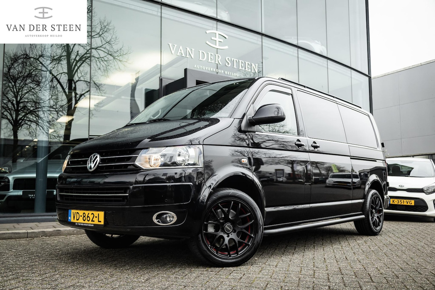 Volkswagen Transporter Caravelle - 2.0 TDI L2H1 DC Highline Marge | Caravelle | Schuifdak | Leder - AutoWereld.nl