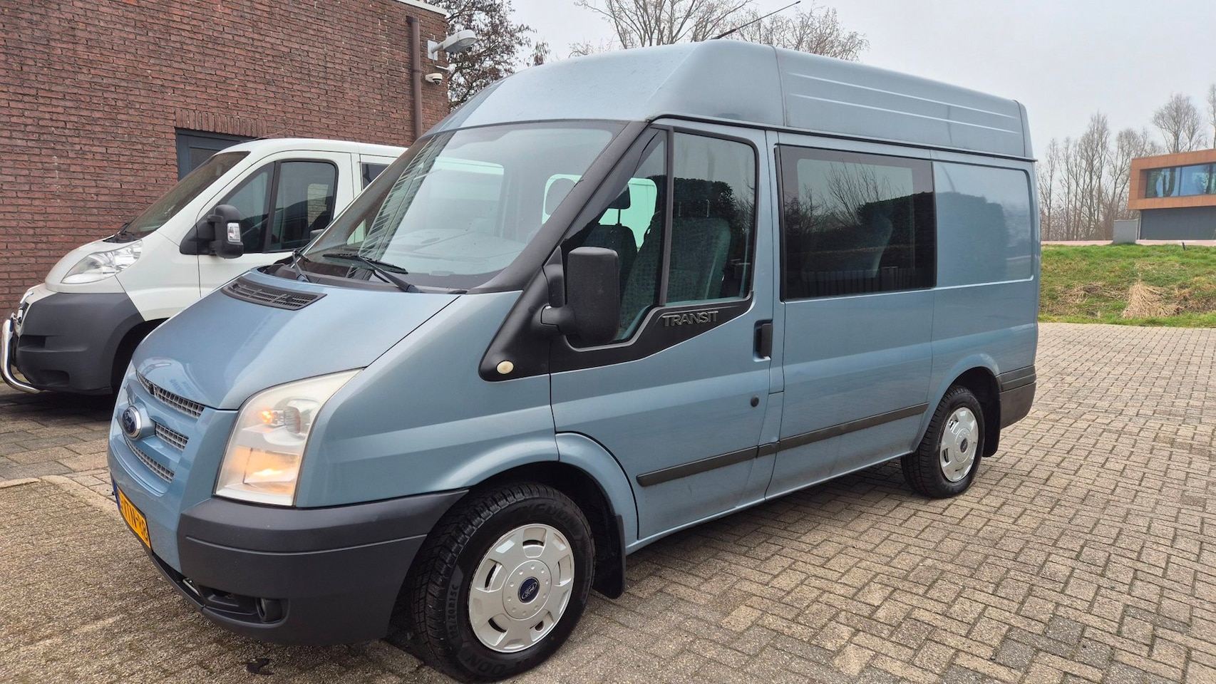 Ford Transit - 260S 2.2 TDCI Ambiente DC rolstoel bus - AutoWereld.nl