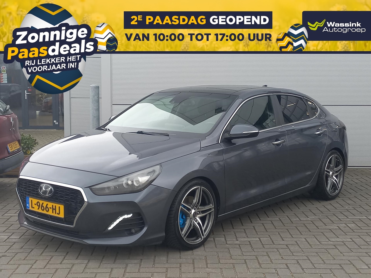 Hyundai i30 Fastback - 1.4T 140pk Premium Automaat | Climate control | Navigatie | Leer | Winterpack | Open dak | - AutoWereld.nl
