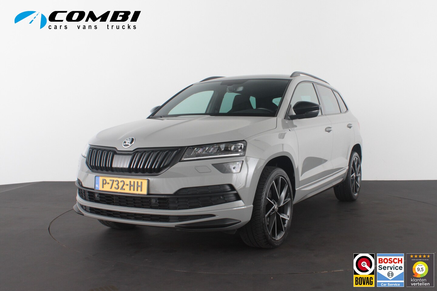 Skoda Karoq - 1.5 TSI ACT Sportline Business > 150pk/Camera/Trekhaak wegklapbaar/Steel Grey/19inch... - AutoWereld.nl