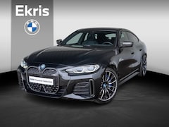 BMW i4 - M50 | High Executive | M Carbon Exterieur pakket | Harman Kardon | Achteruitrijcamera | St