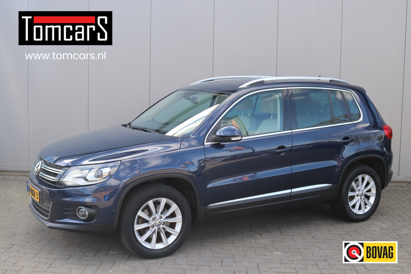 Volkswagen Tiguan - 2.0 TSI 180PK Automaat 4Motion Sport&Style Leder/Parkeerhulp/Bluetooth - AutoWereld.nl