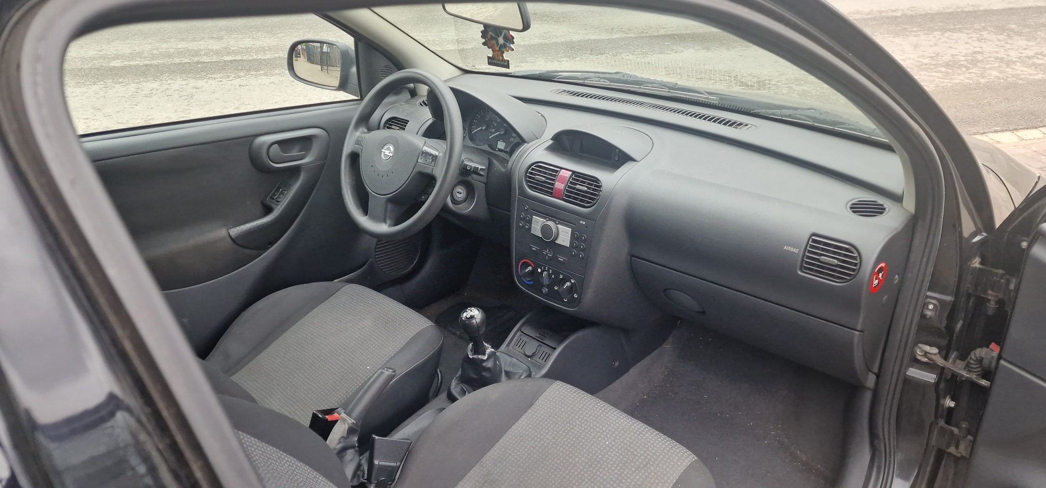 Opel Corsa - 1.0-12V Rhythm