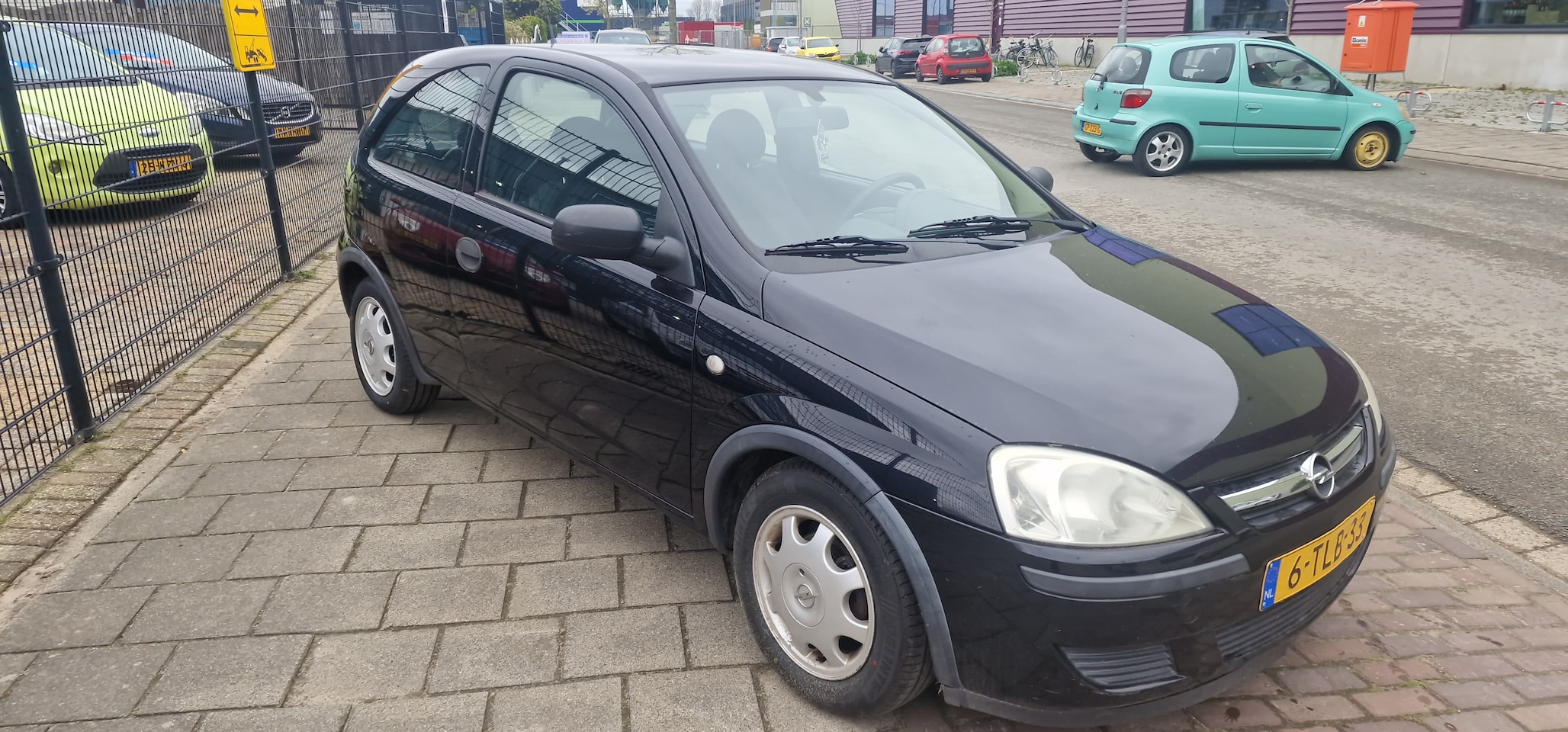Opel Corsa - 1.0-12V Rhythm