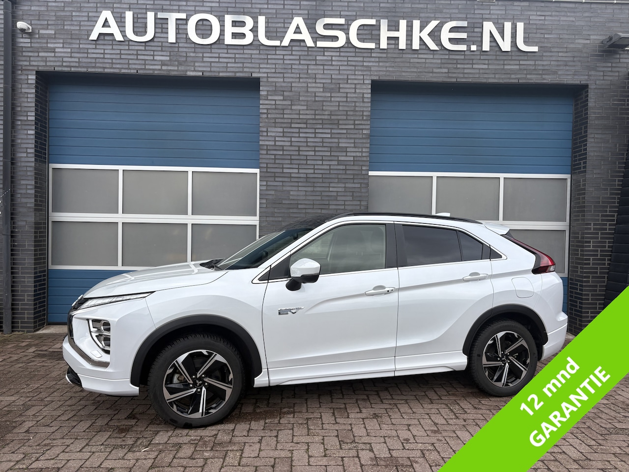 Mitsubishi Eclipse Cross - 2.4 PHEV Instyle 2.4 PHEV Instyle, trekhaak, head-up, pano, leder, compleet! - AutoWereld.nl