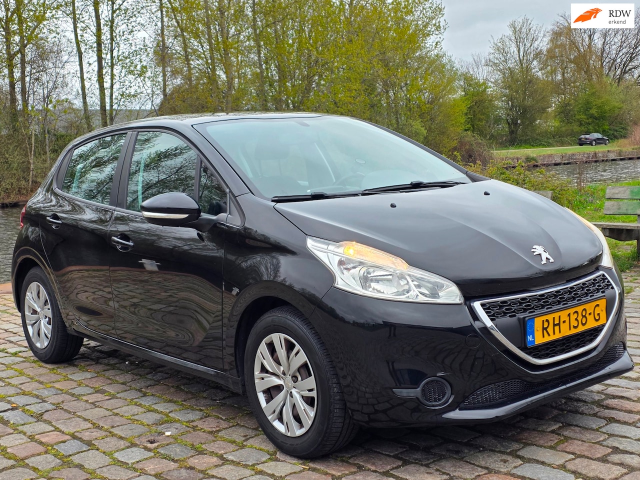 Peugeot 208 - 1.2 VTi Access 2e eigenaar dealer onderhouden uniek km stoelverwarming airco Bluetooth cru - AutoWereld.nl