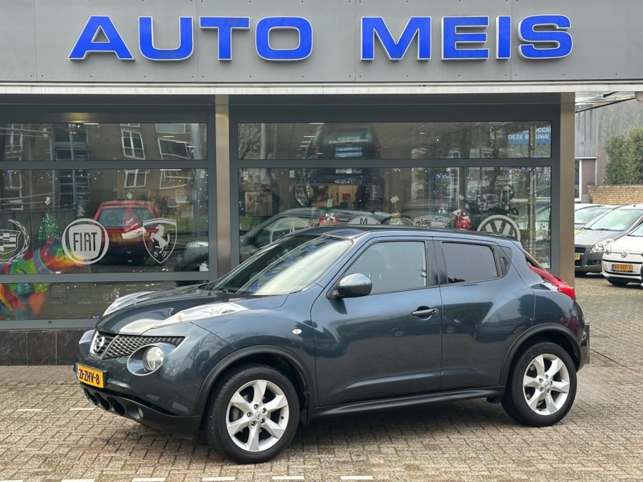 Nissan Juke - 1.6 Acenta AUTOMAAT DEFECT Navi Camera Airco Cruise Trekhaak - AutoWereld.nl