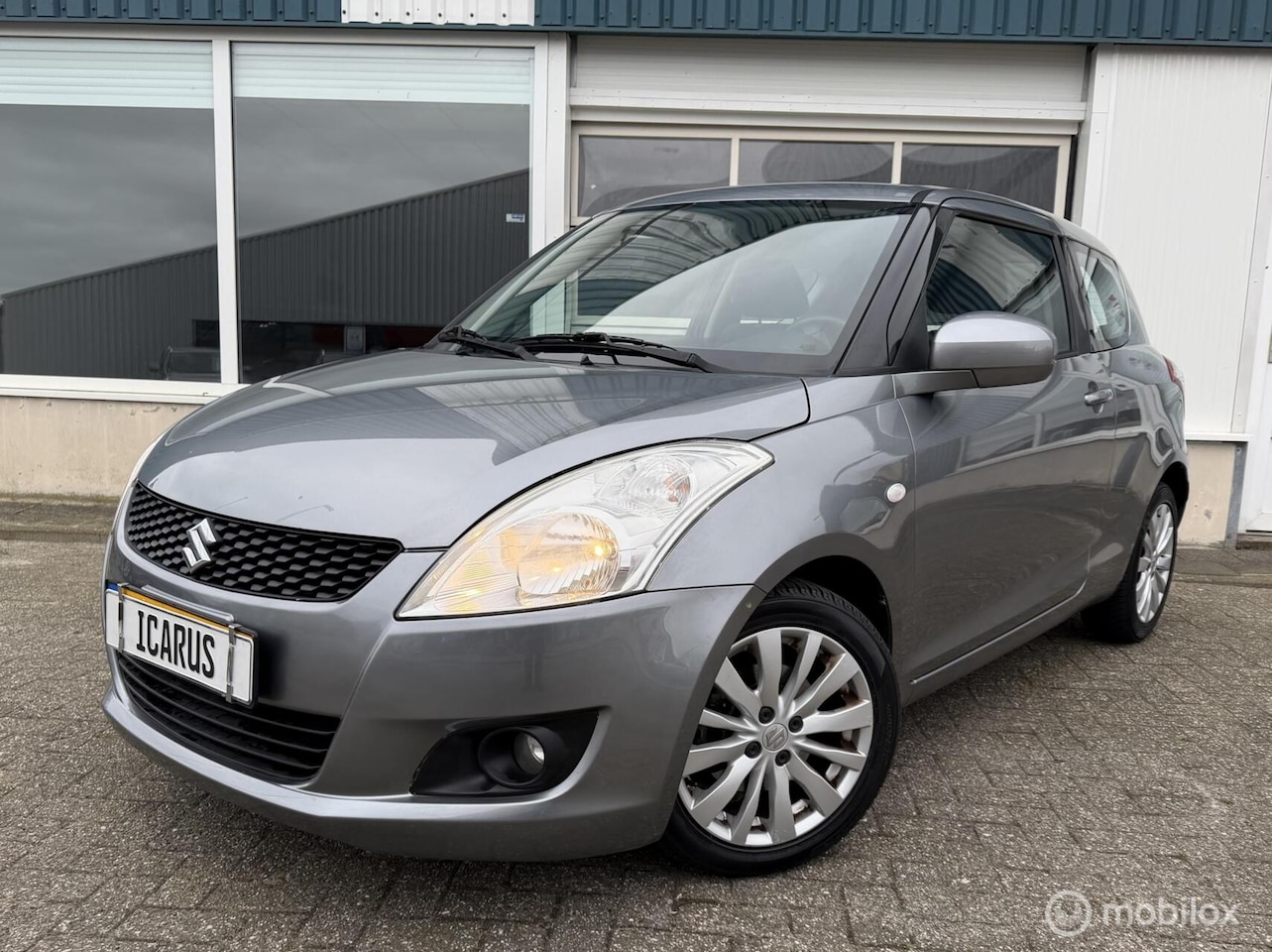 Suzuki Swift - 1.2 Exclusive EASSS apk|airco|cruise| - AutoWereld.nl