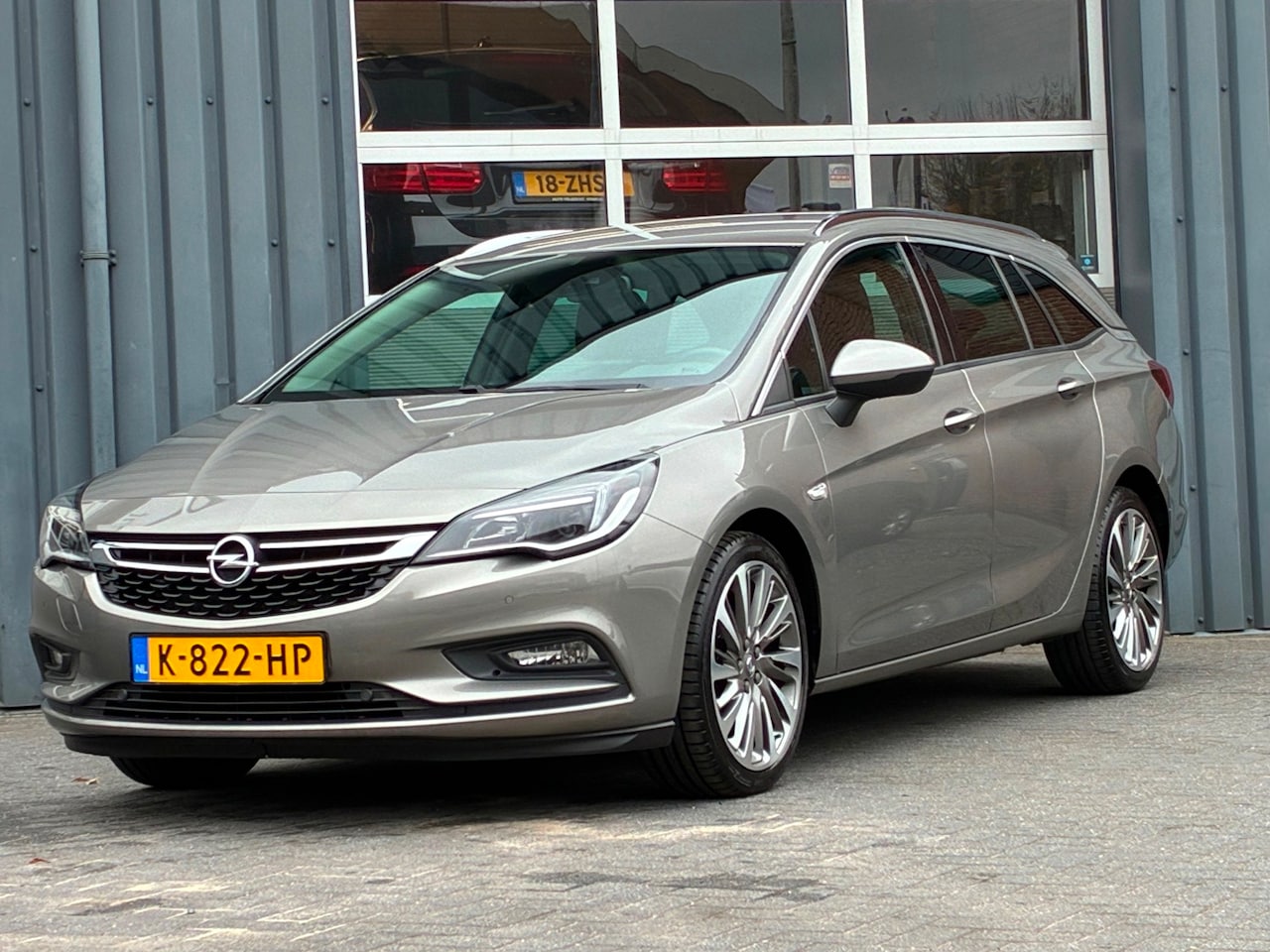 Opel Astra Sports Tourer - 1.4 Innovation Automaat Leder Stoelverwarming Navigatie - AutoWereld.nl