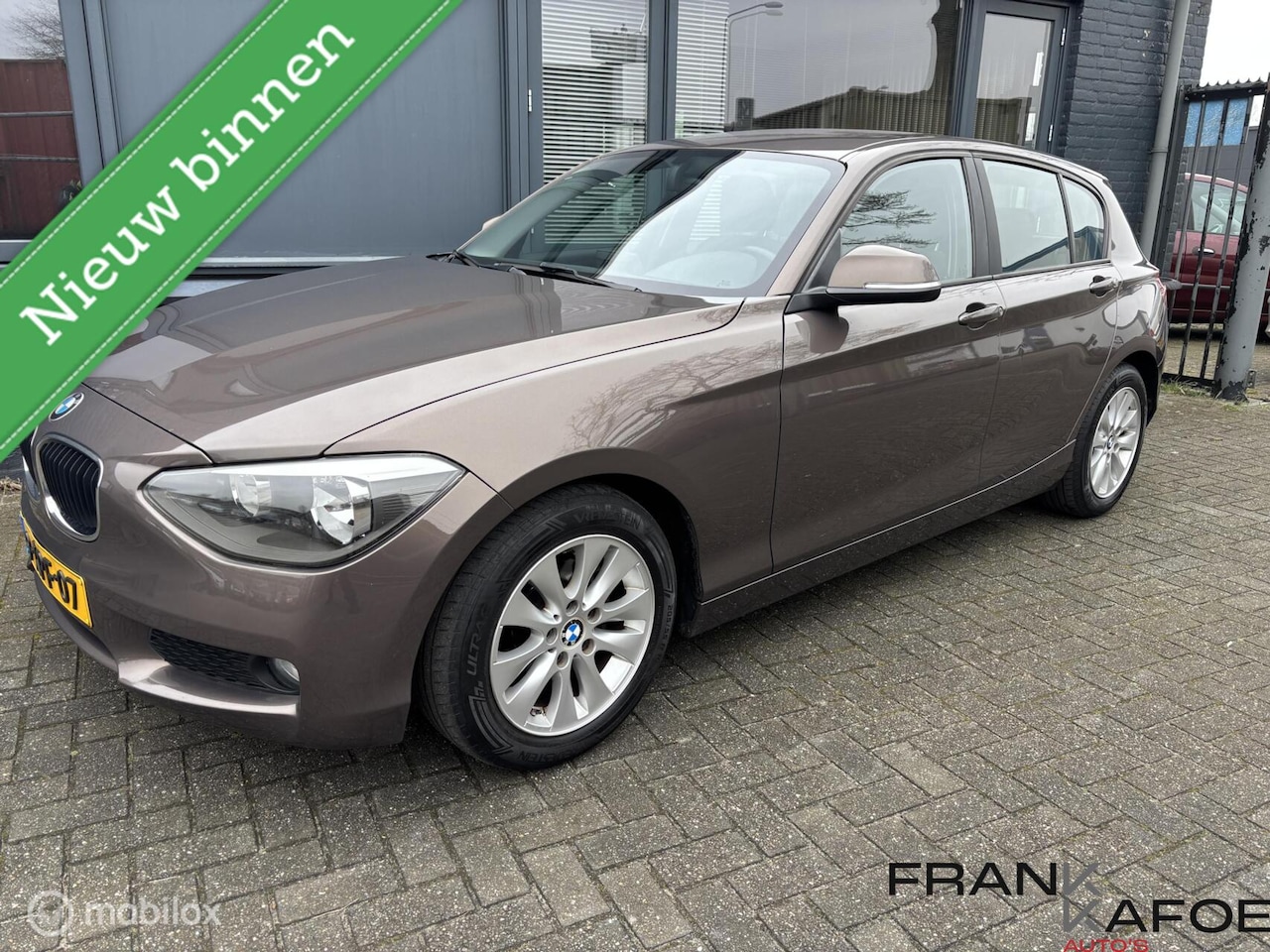 BMW 1-serie - 1.6i Business Navi Airco LMV Bl.tooth Cruise 5drs - AutoWereld.nl