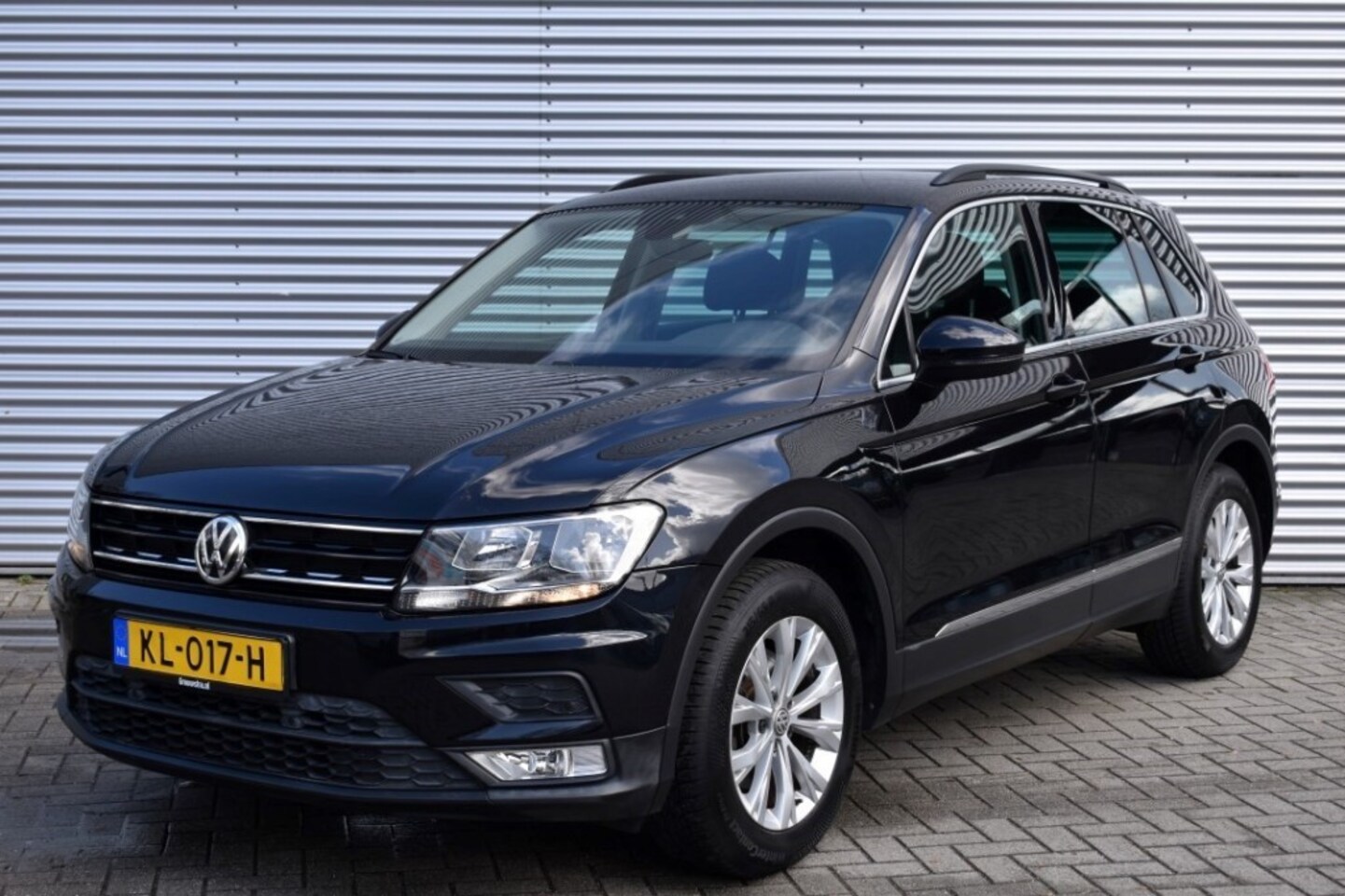 Volkswagen Tiguan - 1.4 TSI DSG COMFORTLINE / PDC V+A / NAVI / P.GLASS - AutoWereld.nl