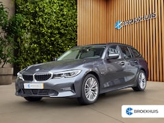 BMW 3-serie Touring - 320e Business Edition Plus | Trekhaak | Panoramadak | Stoelverwarming | Leder