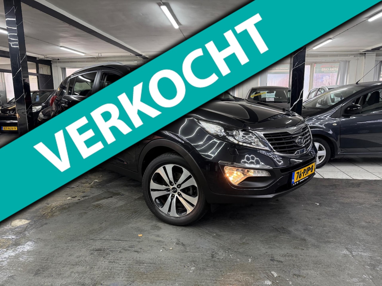 Kia Sportage - 2.0 X-clusive Automaat | stoelverwarming |Navi|Camera - AutoWereld.nl