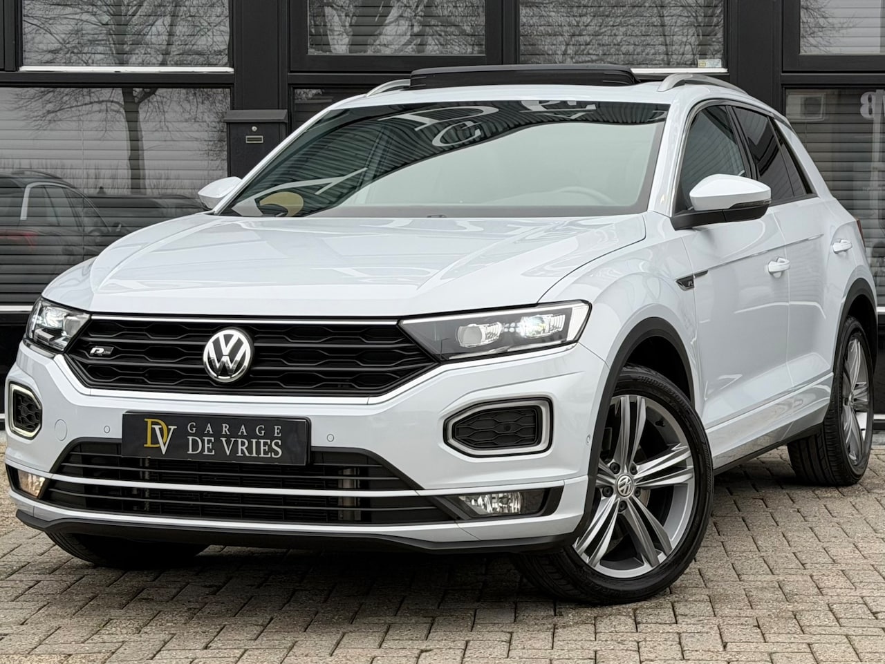 Volkswagen T-Roc - 2.0 TSI 4Motion Sport R-Line DSG Panoramadak ACC Virtual Garantie - AutoWereld.nl