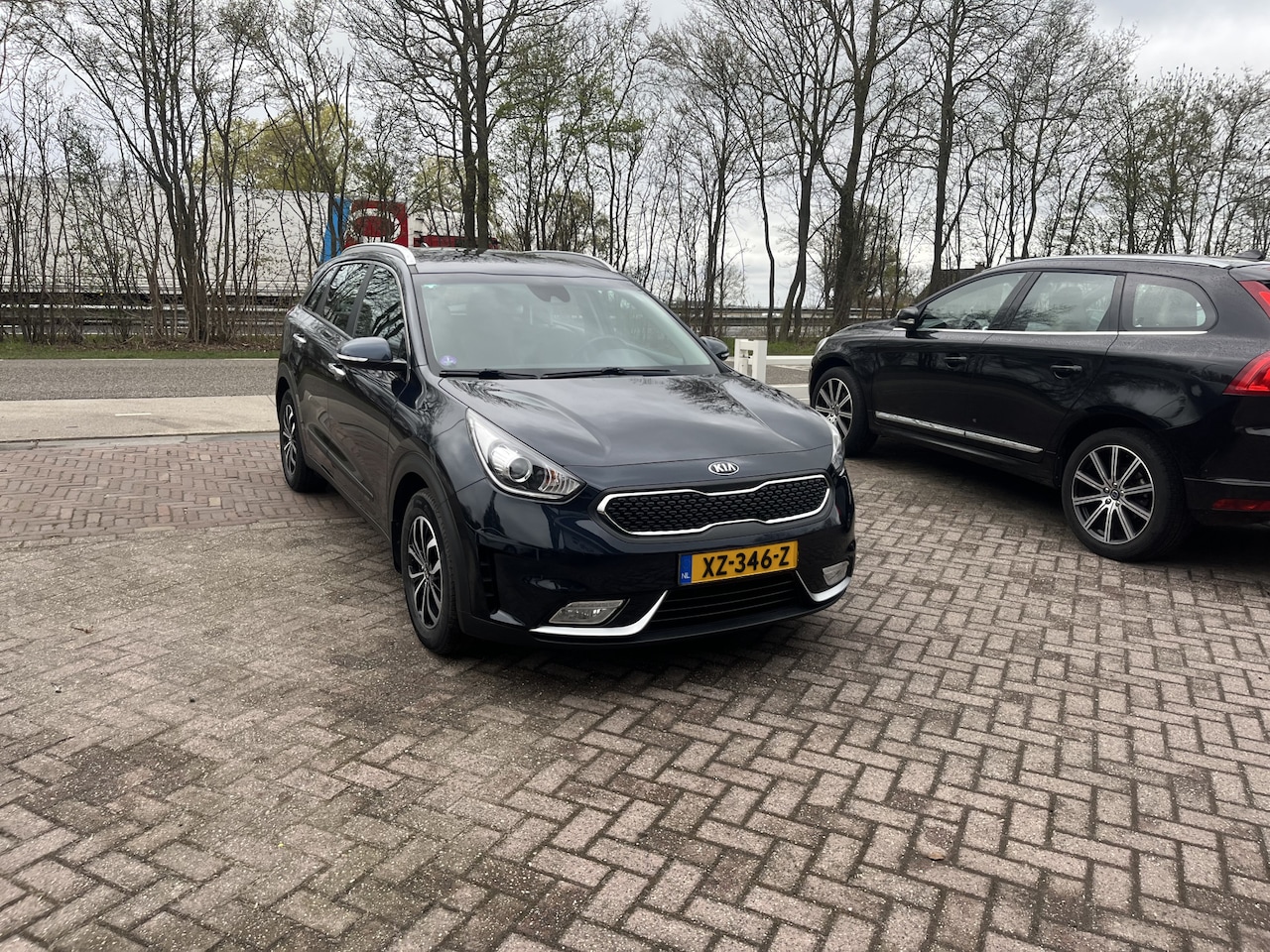Kia Niro - 1.6 GDi Hybrid DynamicLine TREKHAAK CAMERA HALF LEER - AutoWereld.nl