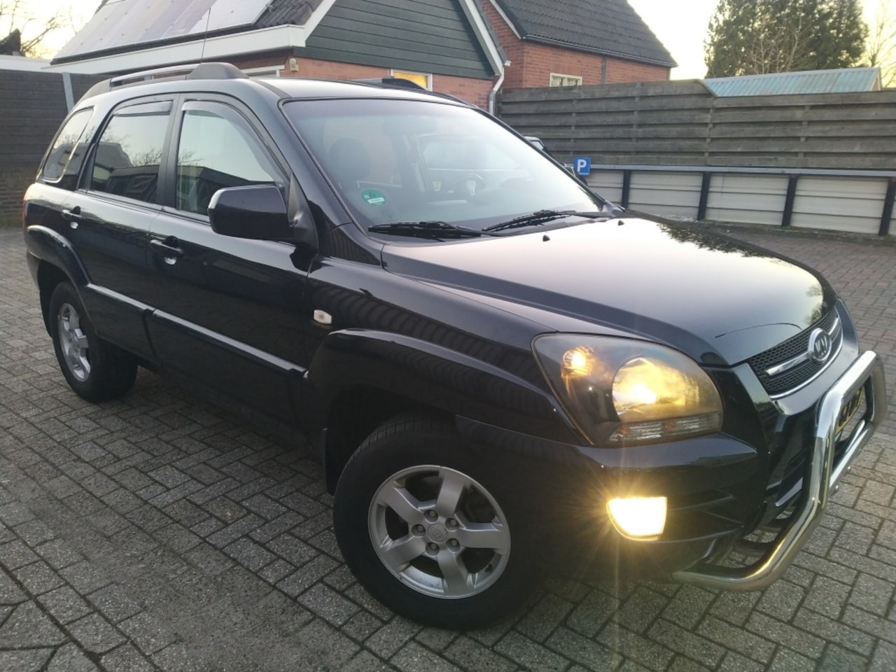 Kia Sportage - 2.0 CVVT X-cite 2.0 CVVT X-cite - AutoWereld.nl