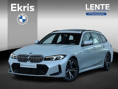 BMW 3-serie Touring - 318i M-Sportpakket / Achteruitrijcamera / Trekhaak / Panoramadak / Stoelverwarming / 18''