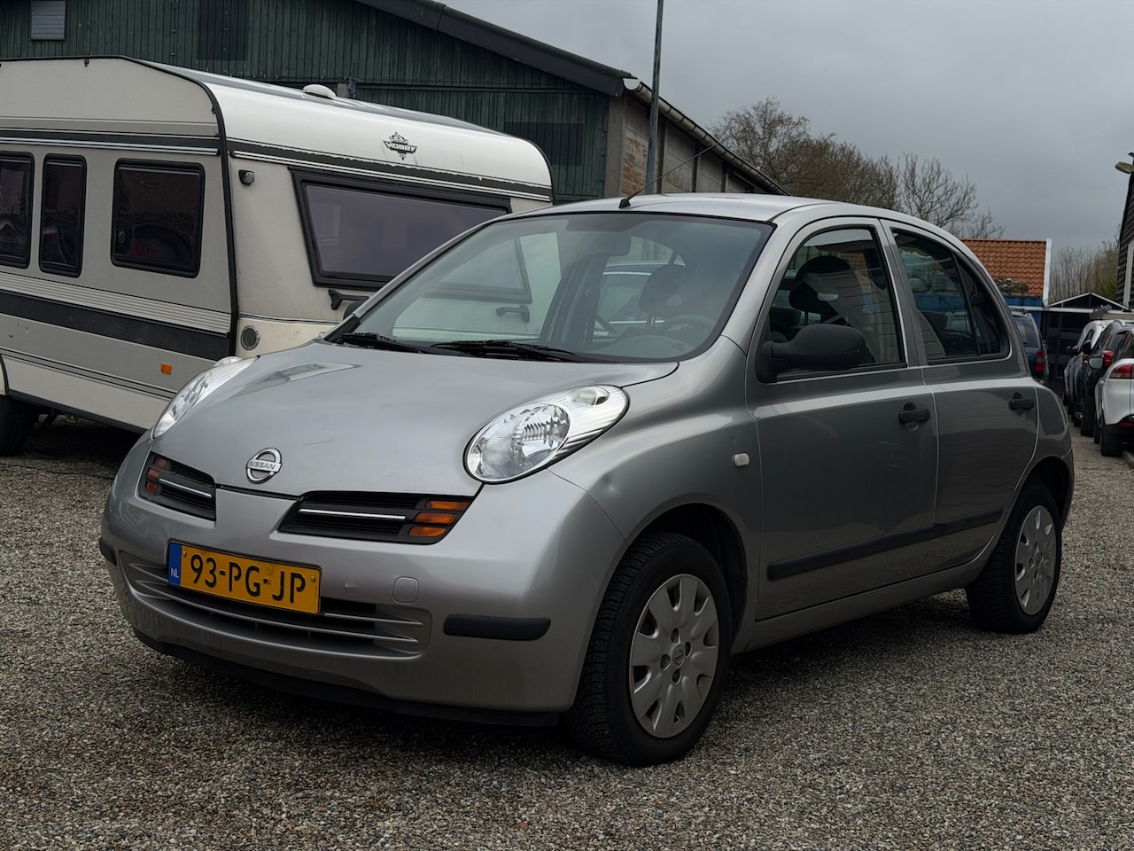 Nissan Micra - 1.2 Visia 2e Eig 69000km NAP Airco Elektrisch ramen Afstandbediening - AutoWereld.nl