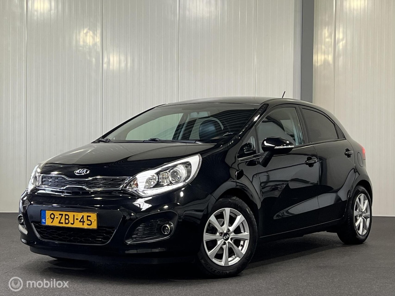 Kia Rio - 1.2 CVVT World Cup Ed. [ NAP leder trekh cruise ] - AutoWereld.nl