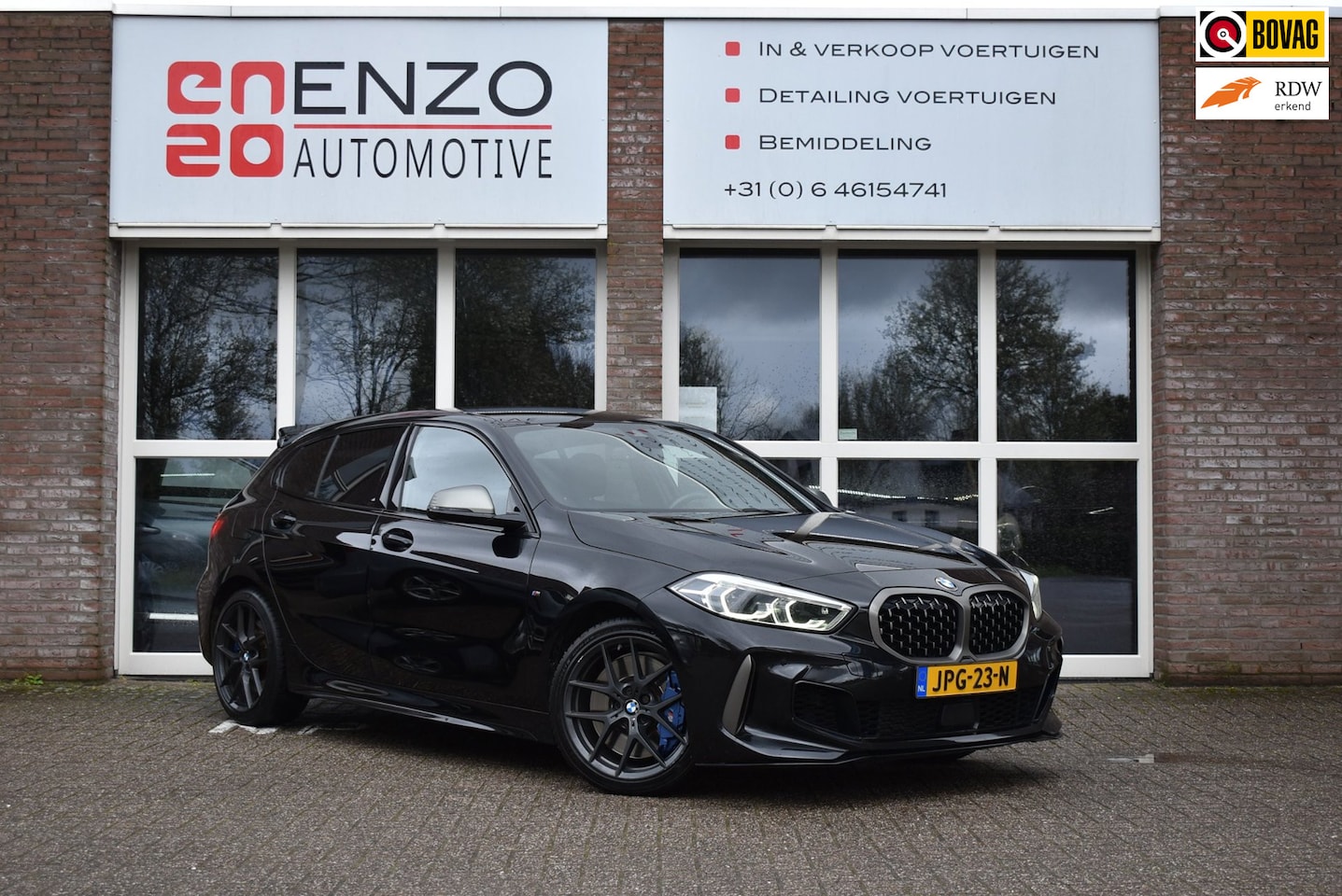 BMW 1-serie - M135i xDrive High Executive Head up Carplay Maxton Carpass - AutoWereld.nl