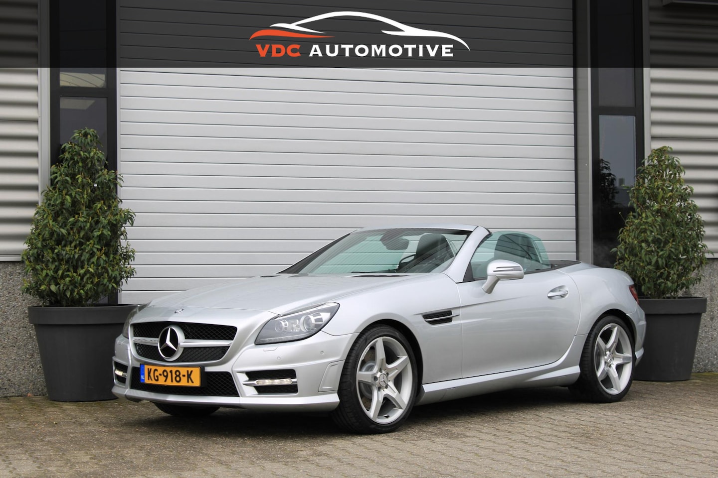 Mercedes-Benz SLK-klasse - 200 AMG Pano | Airscarf | Stoelverwarming | HarmanKardon | Sfeerverlichting | Dealer Onder - AutoWereld.nl