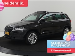 Skoda Karoq - 1.5 TSI Business Edition | Panoramadak | Leder | Stoelverwarming | Adaptive cruise | Side