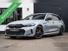 BMW 3-serie Touring - 330e xDrive M stoel Pano H&K HUD Carbon